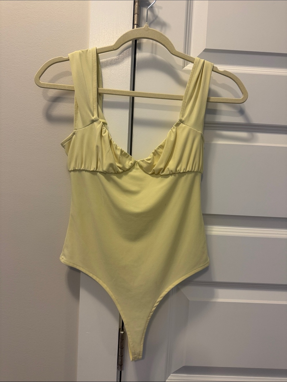 Yellow bodysuit for women